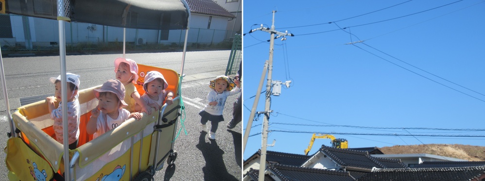 子どもたちがショベルカーを見ている