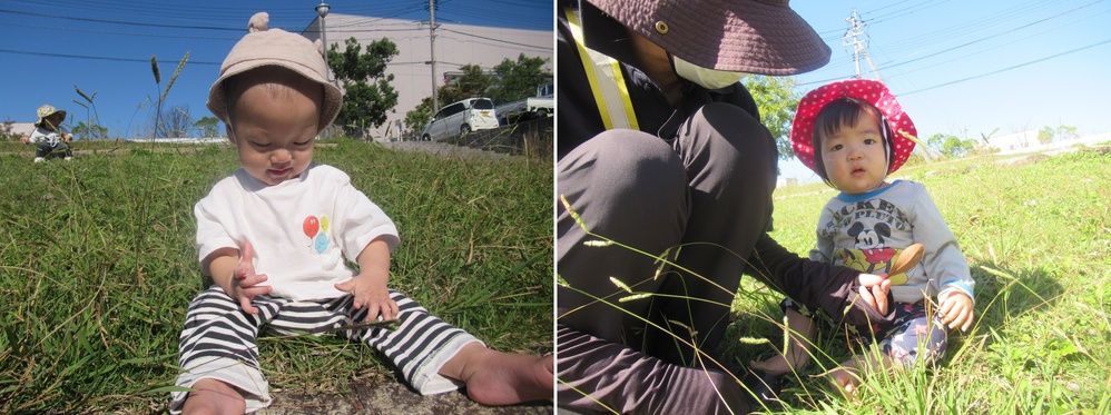 子どもが草の上に座っている