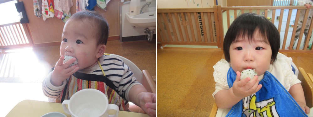 子どもがおにぎりを食べている２