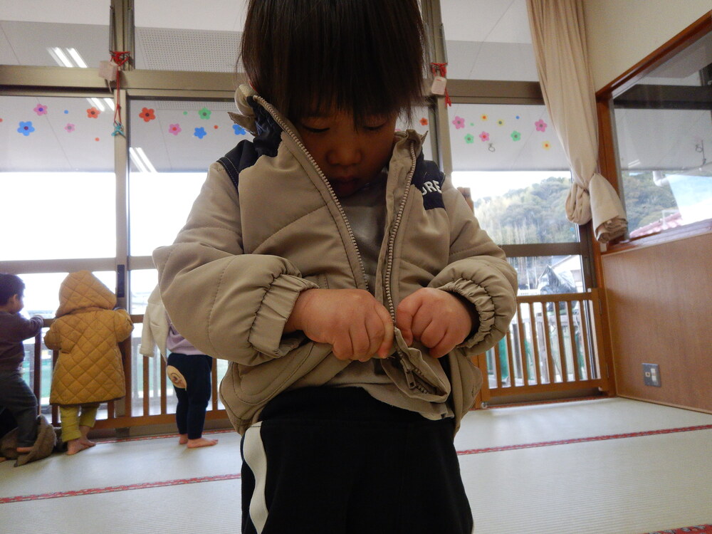 ジャンバーを着る