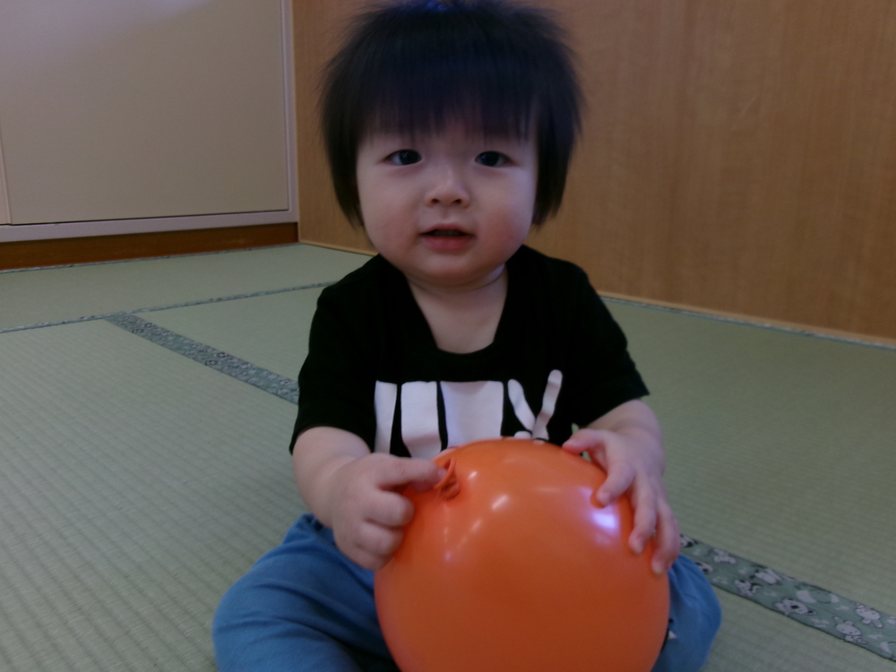 風船を掴む