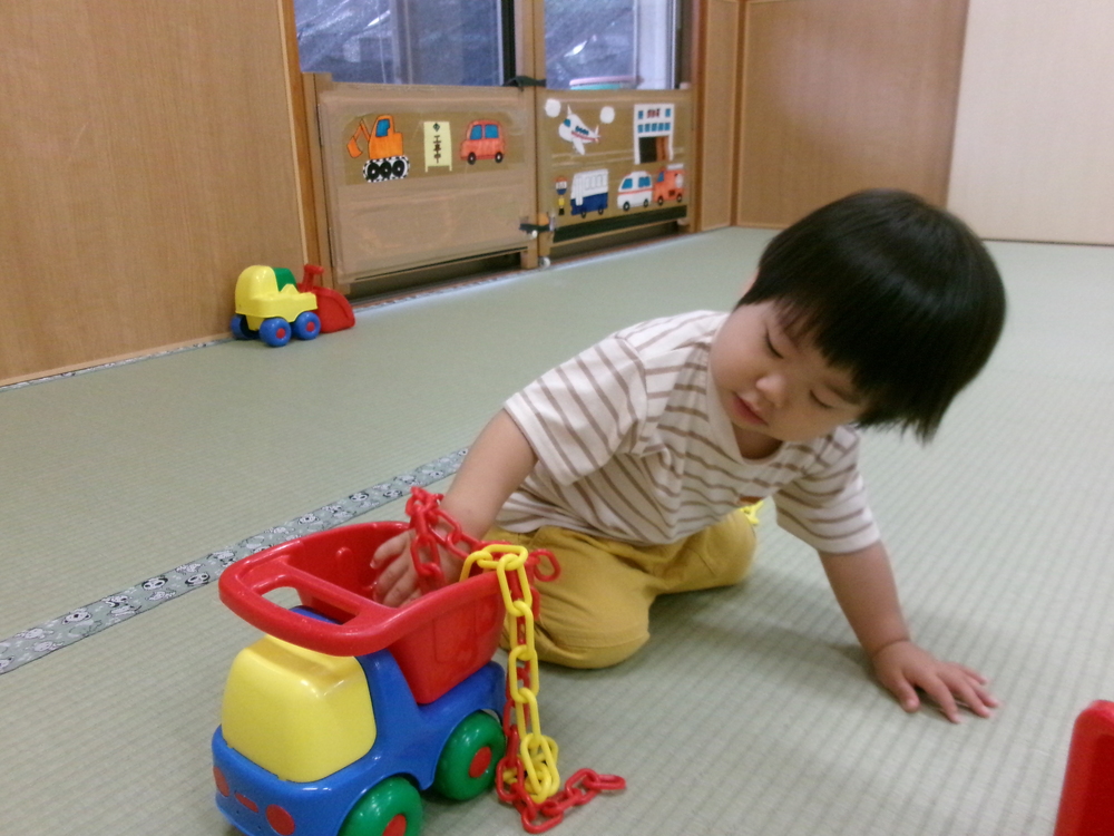 車にチェーンを乗せる