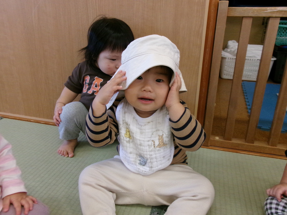帽子をかぶる