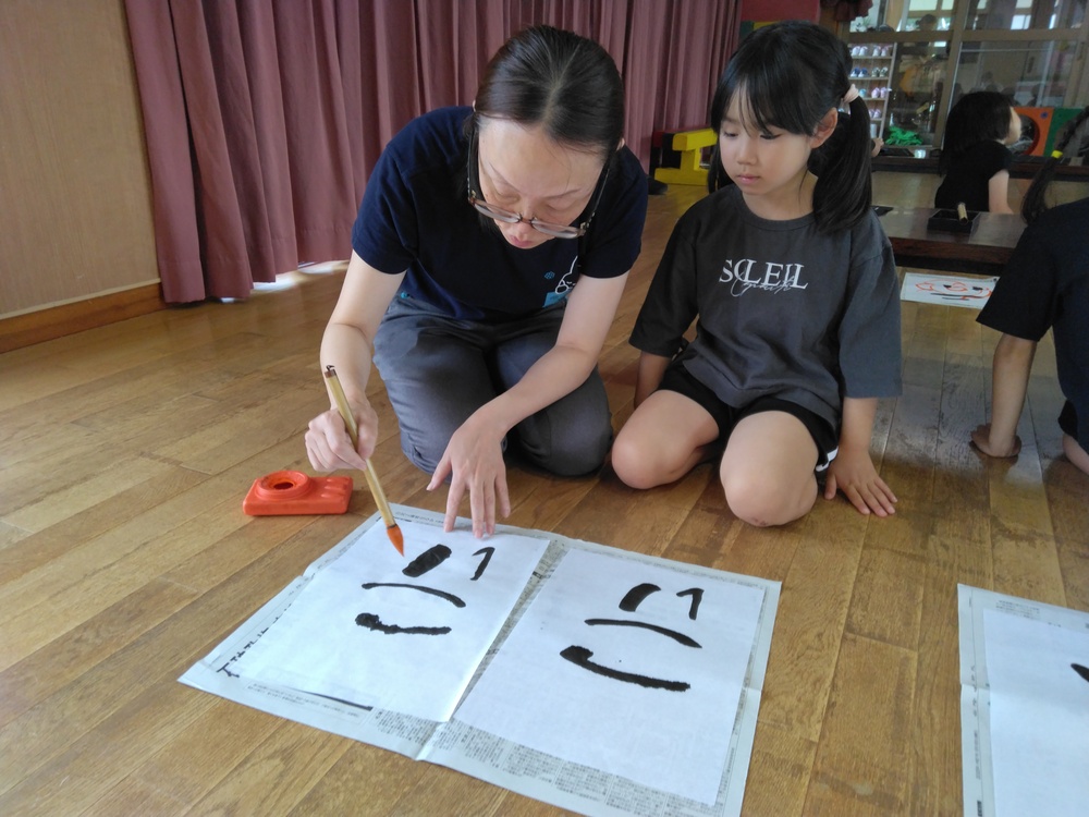 園長先生に見てもらっている様子