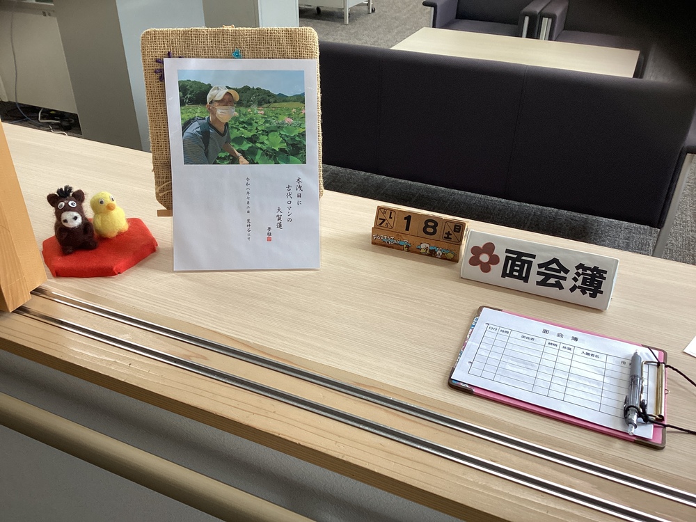 受付に飾ったTさんの写真